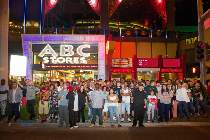 Tourists watch the Mayweather vs. Pacquiao fight through a Monte Carlo bar window from the Las Vegas Strip, on Saturday night, May 2, 2015.